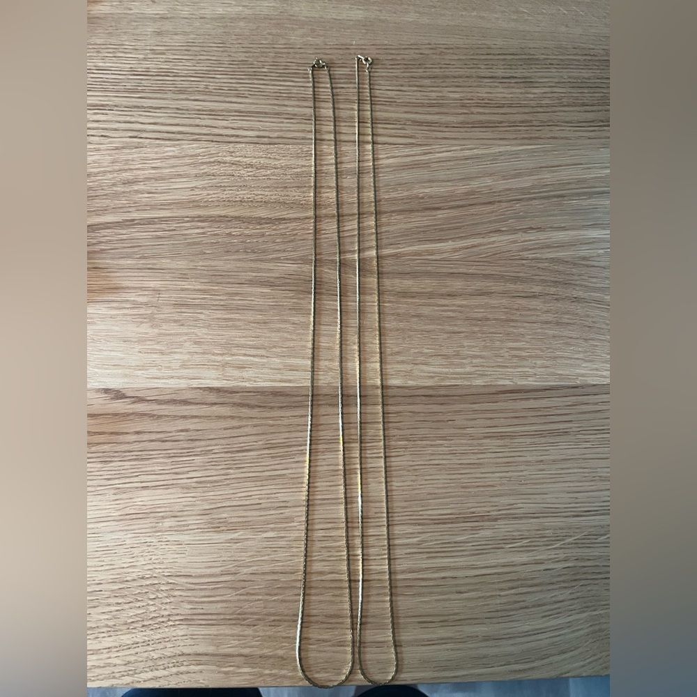 Two gold tone necklaces 29”
